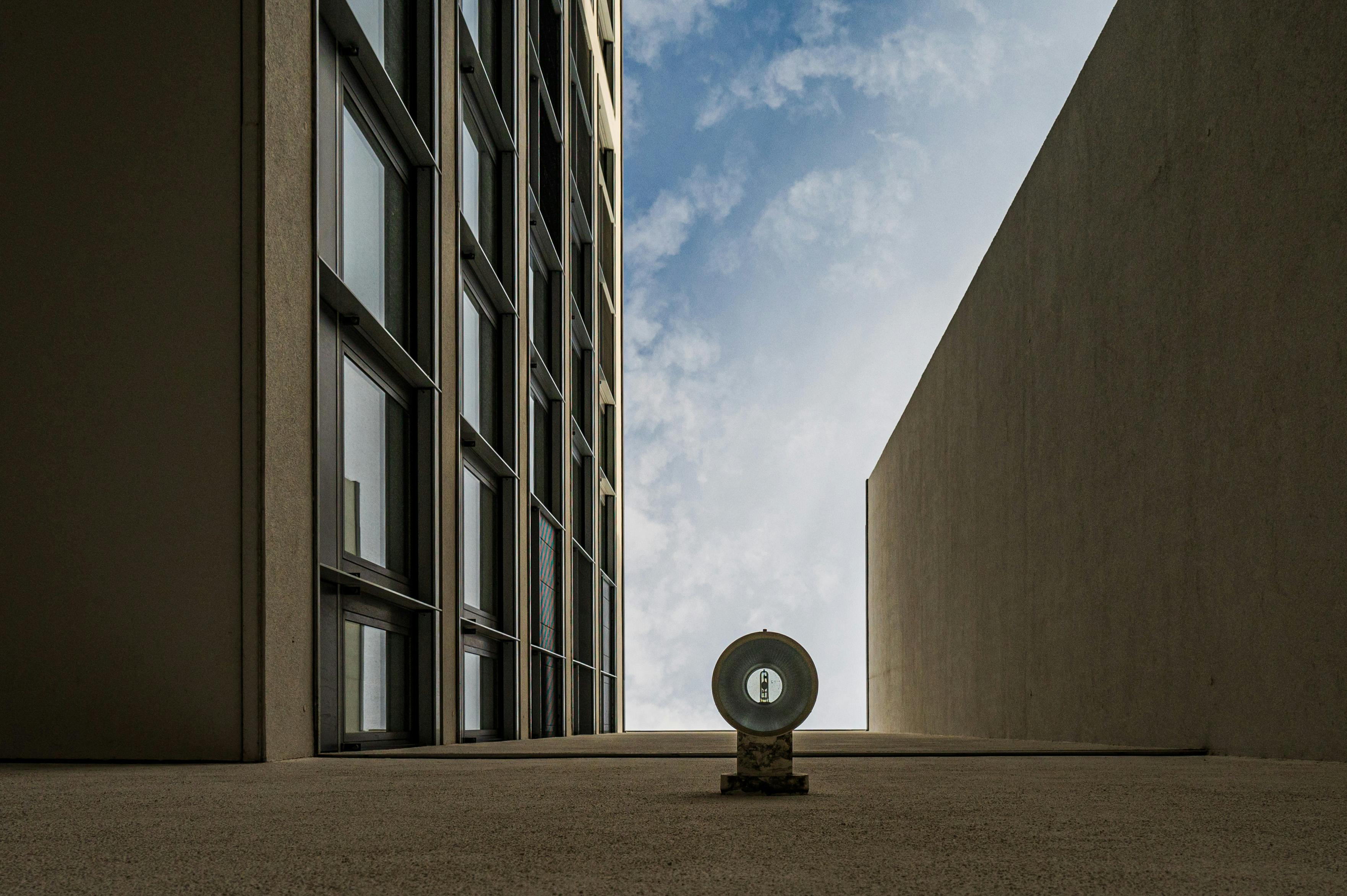 Modern urban architecture in Magdeburg showcasing a dramatic sky view between buildings.