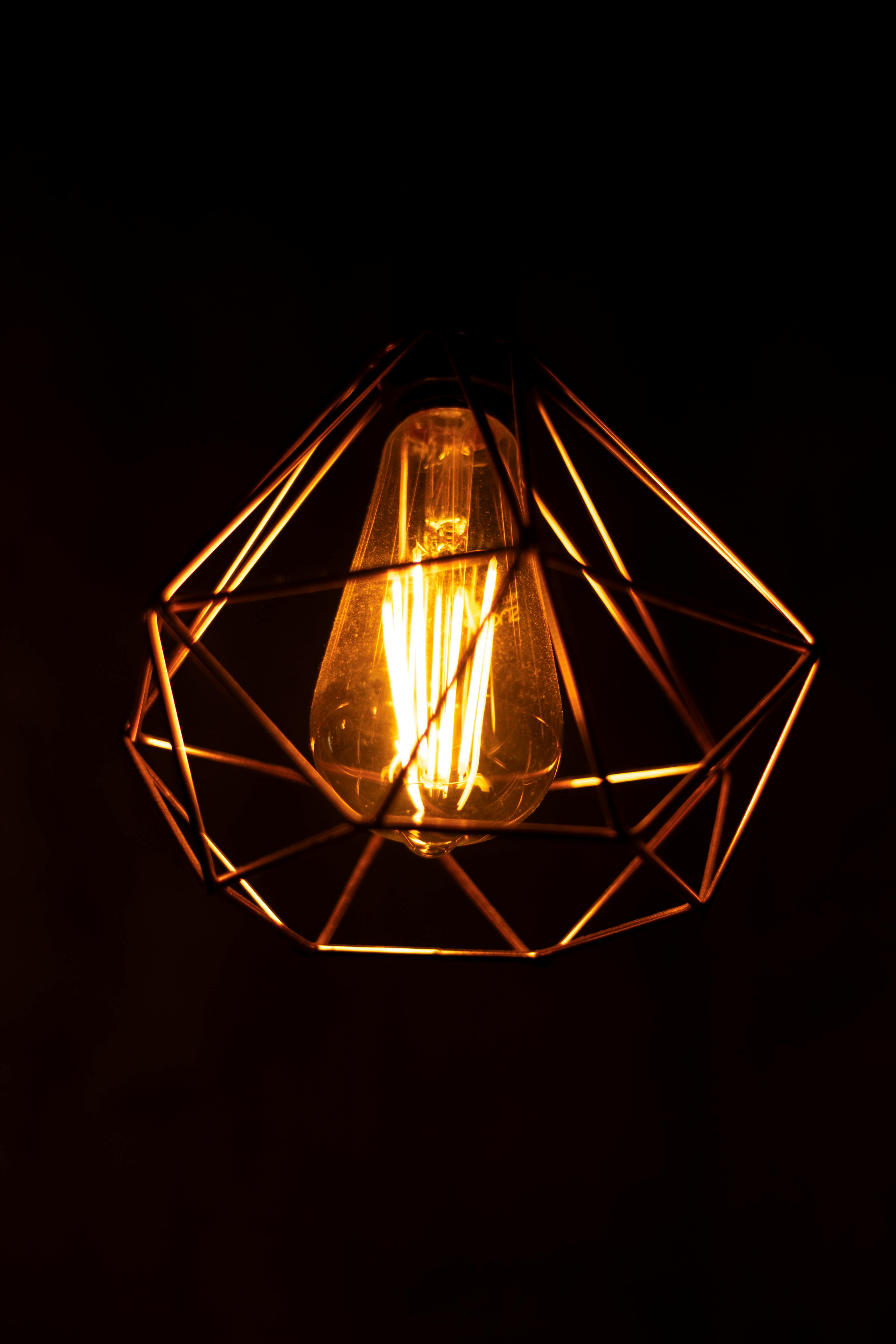 lighted clear light bulb