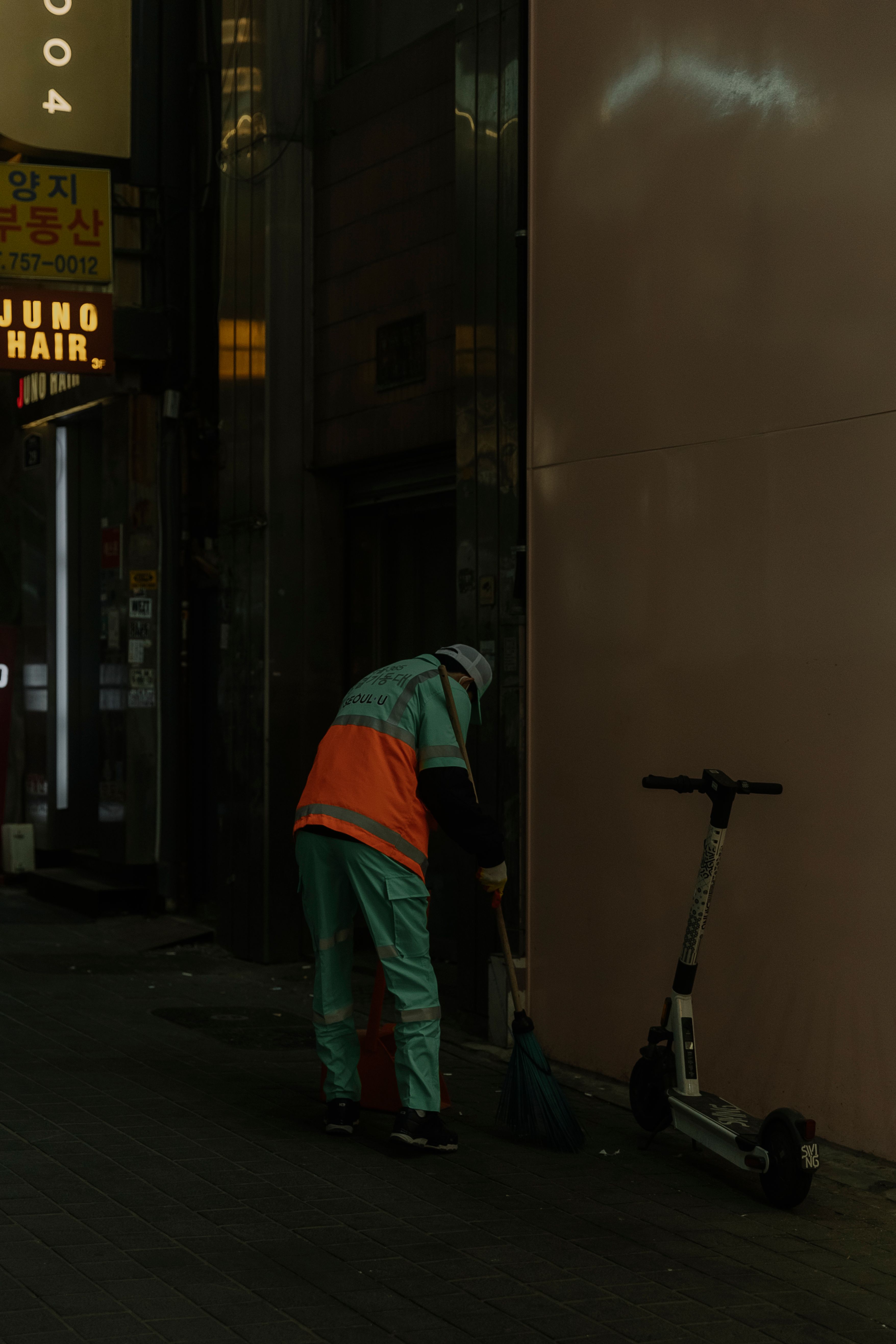 Man Sweeping Sidewalk · Free Stock Photo