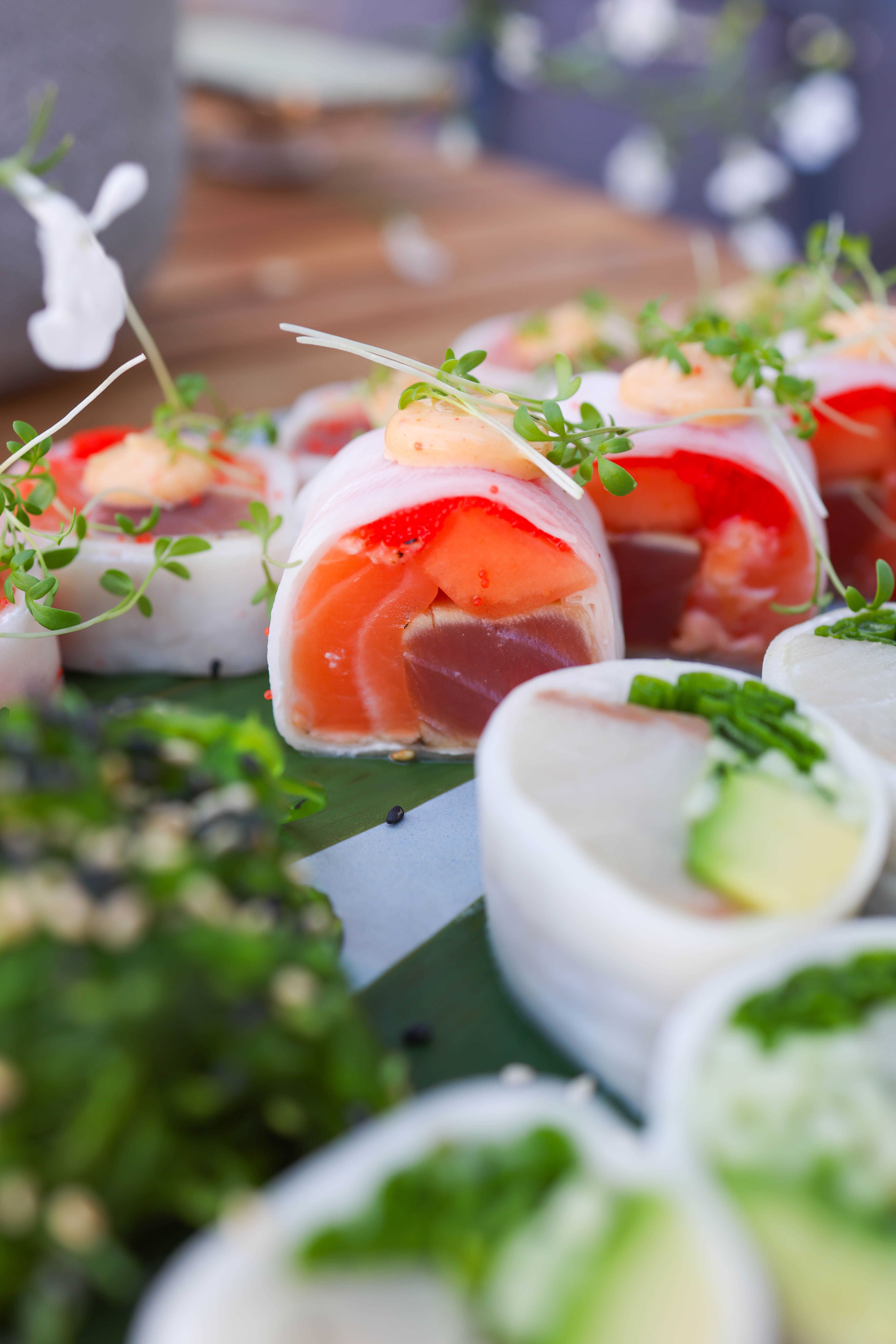Free A vibrant display of fresh sushi rolls and sashimi, perfect for ...