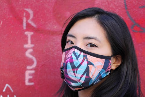 Free stock photo of asian woman, face mask, graffiti