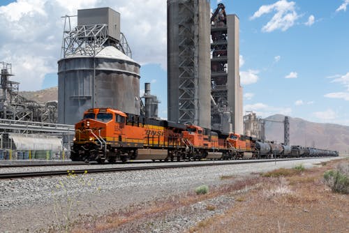 Free stock photo of freight train, industrial architecture, industrial building