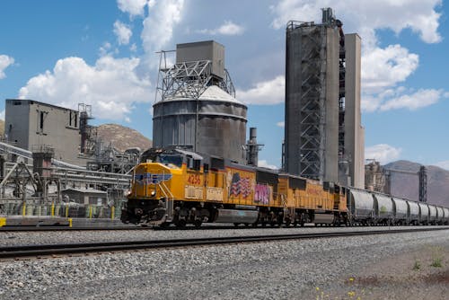 Free stock photo of freight train, industrial architecture, industrial building