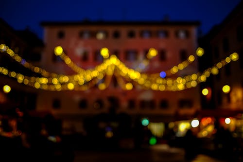 Free Yellow String Lights Outside Building during Dusk Stock Photo
