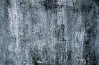 Slate-grey concrete face — photo by Archie Binamira on Pexels
