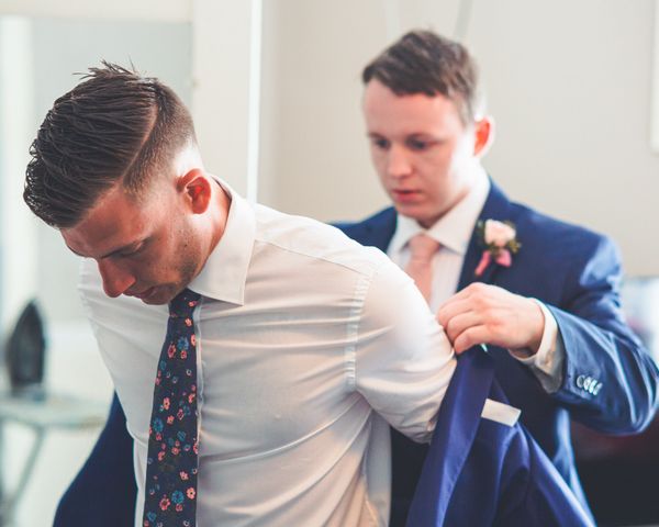 Formal jacket being fitted