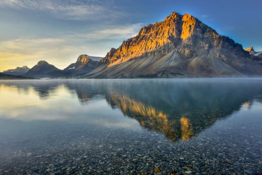 Stunning sunrise view of Bow Lake and mountains in Banff National Park, Alberta, Canada.
