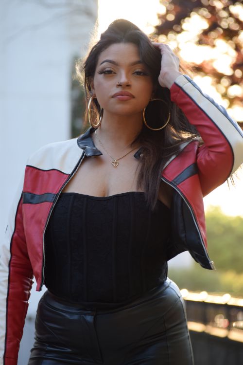 Photo of a Young Woman Wearing a Leather Jacket · Free Stock Photo