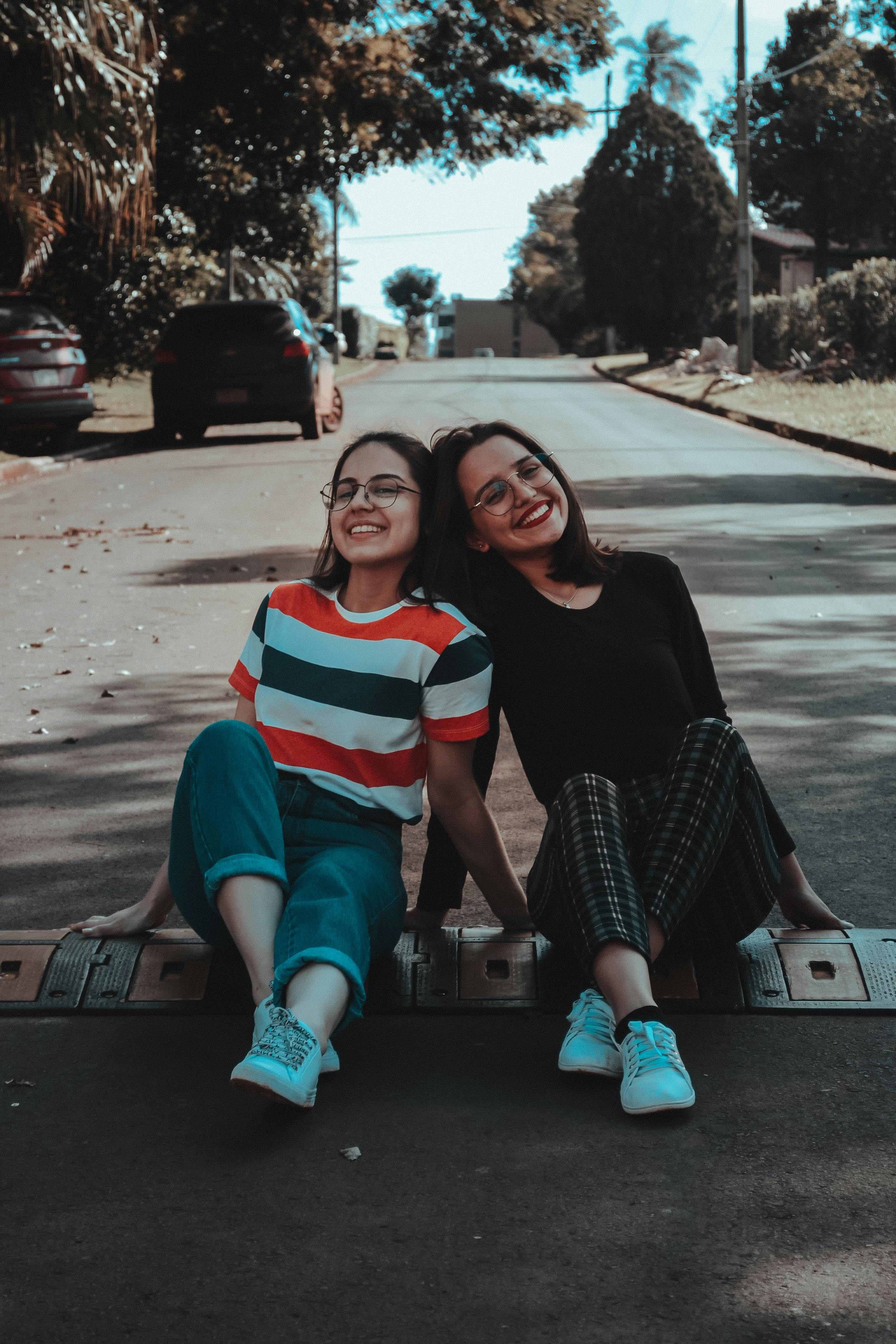 Two happy friends posing for a selfie in a park, Stock Photo, Picture And  Royalty Free Image. Pic. WES-KNSF03236 | agefotostock