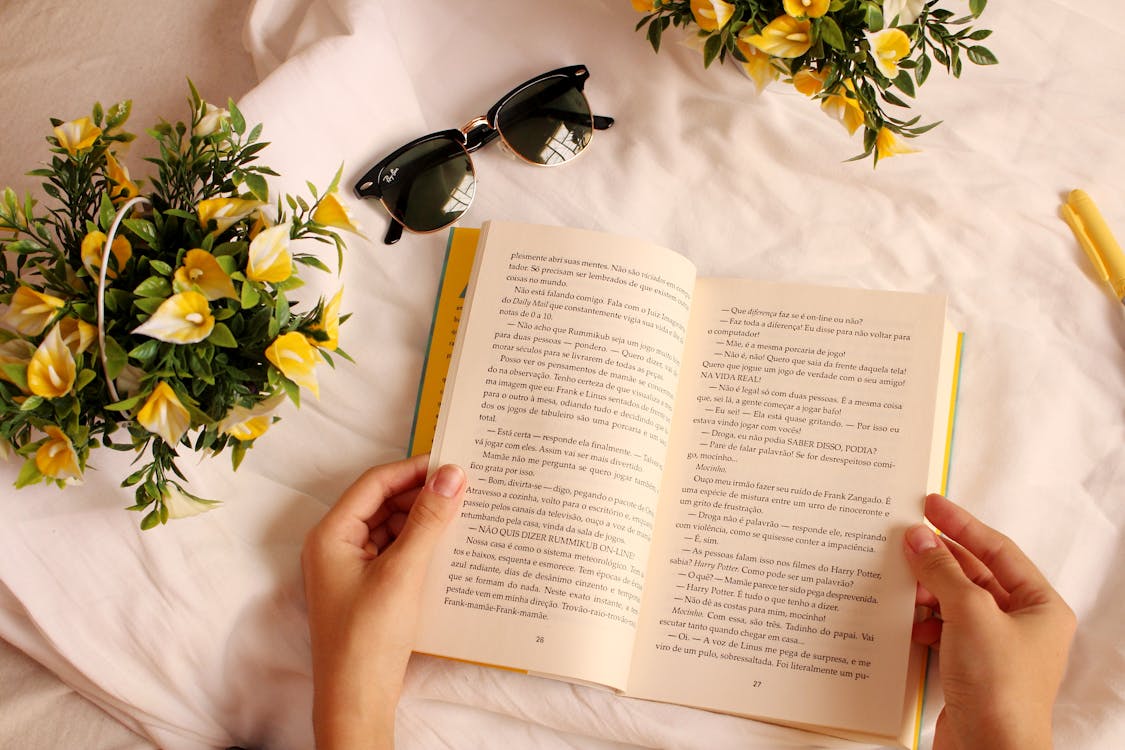 Person Holding A Book