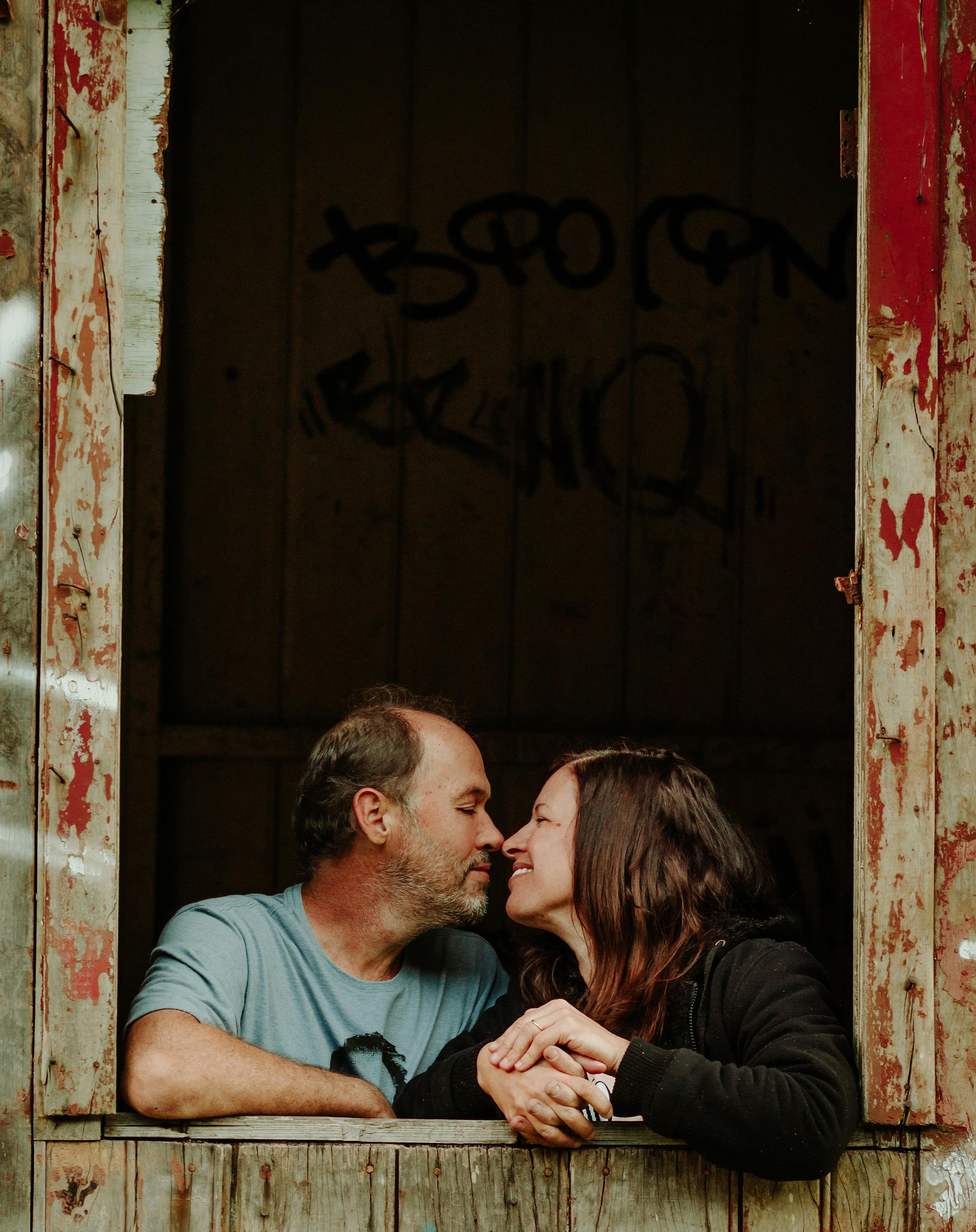 man and woman about to kiss