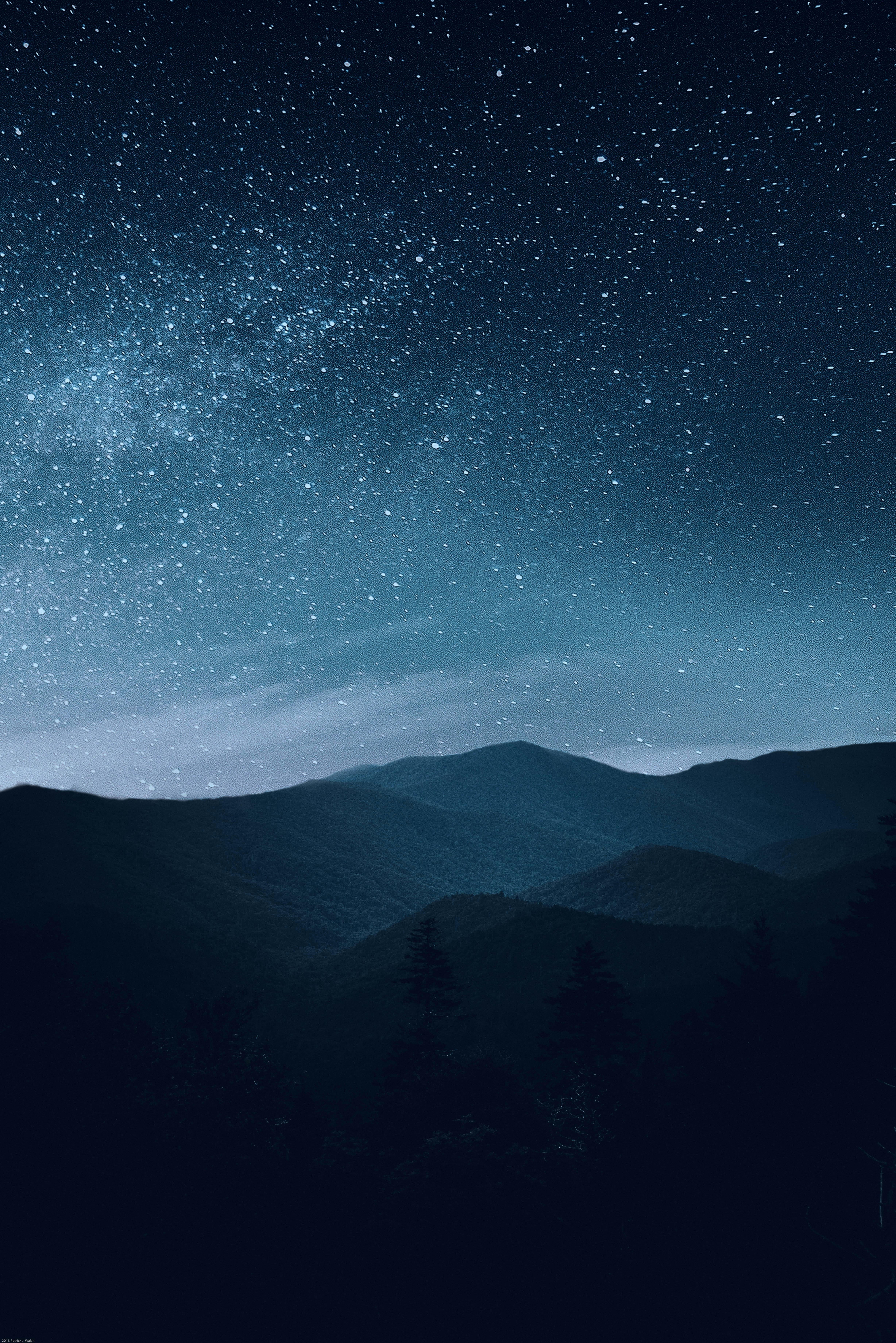 starry sky over mountains