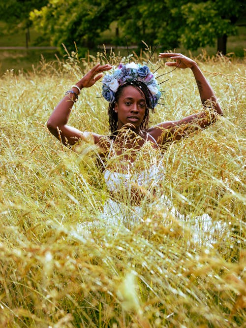 Black Fashion model posing in Open Field 