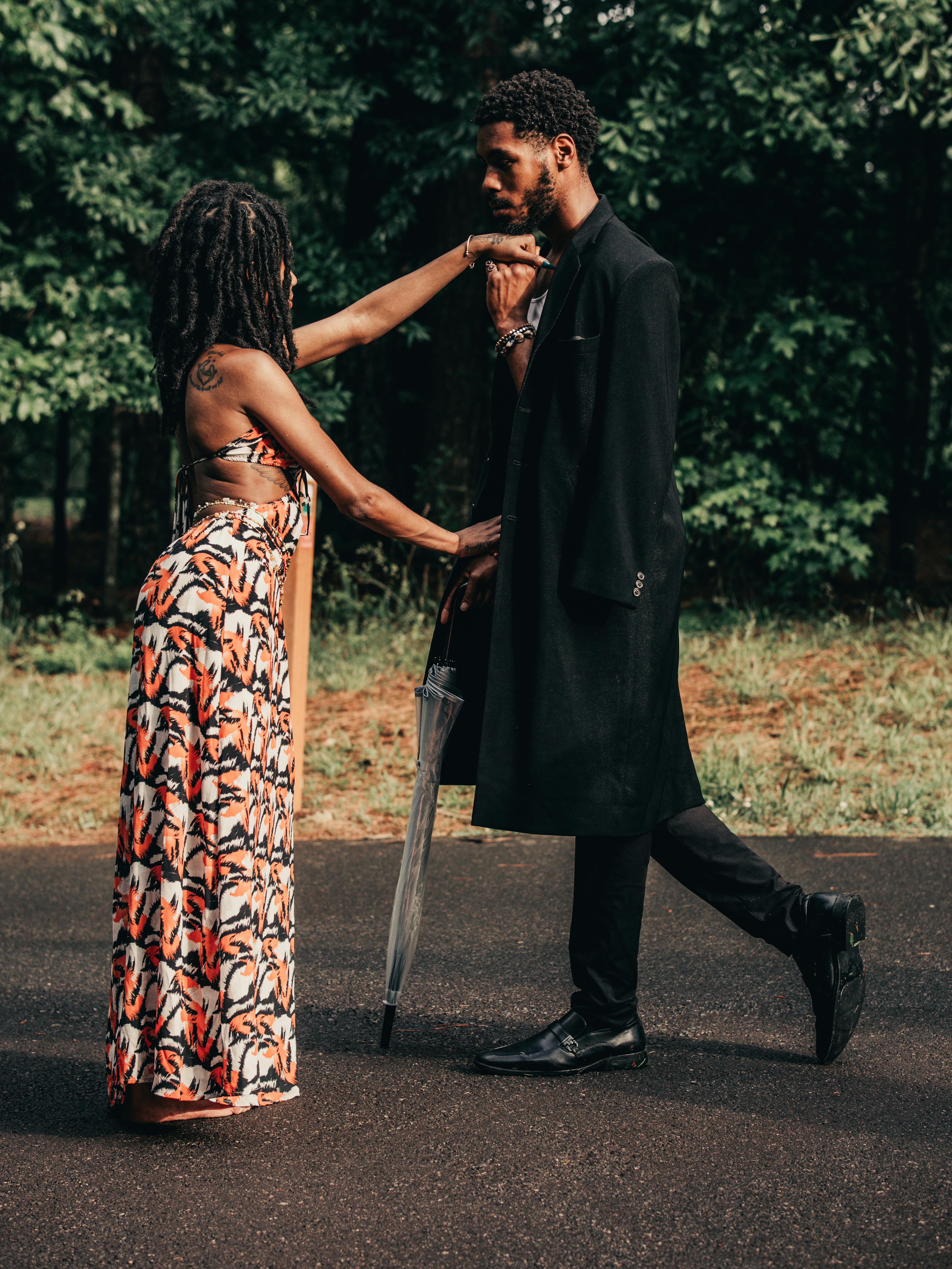 man holding a woman s hand