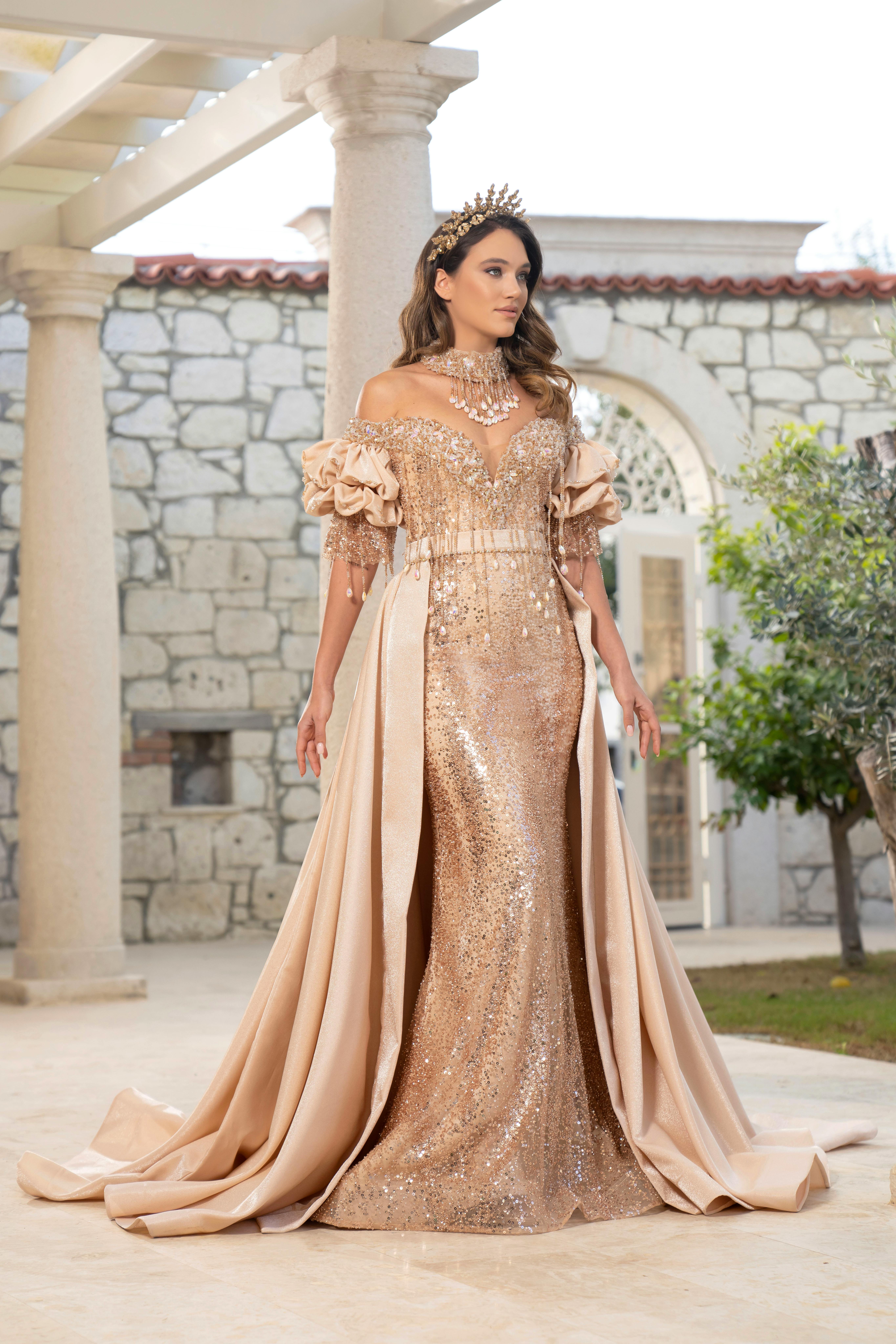 Prețul rochiei purtate de Jennifer Lopez, creată de designerul român Maria Lucia Hohan