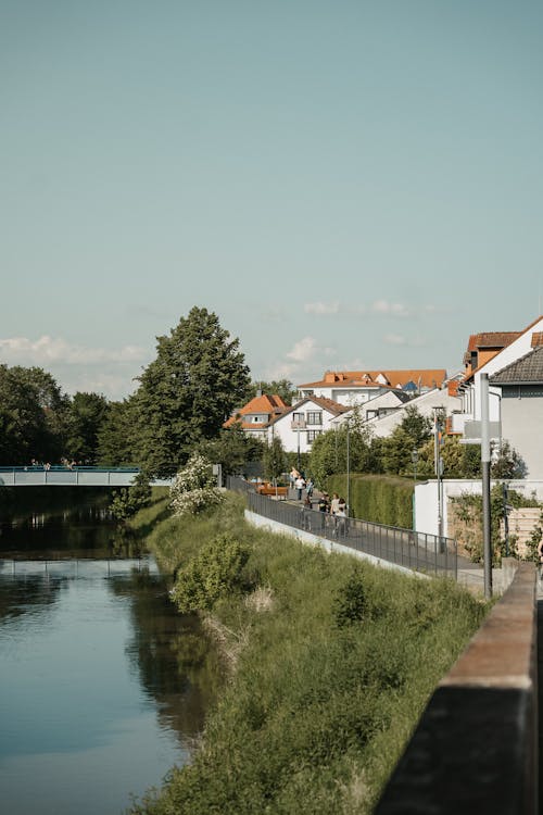A river and houses in the background