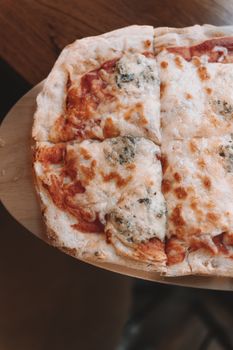 Pizza Served in a Restaurant 