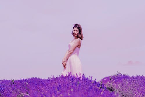 Free Photo of Woman Standing Near Lavender Field Stock Photo