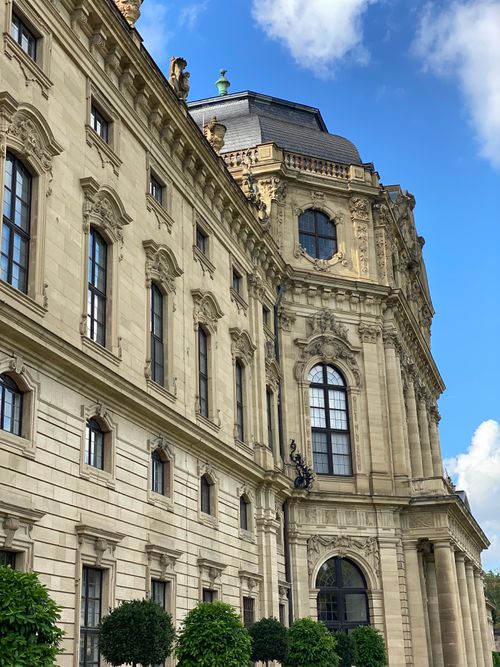 Free Stunning baroque architecture of the Würzburg Residence with intricate details and blue sky background. Stock Photo