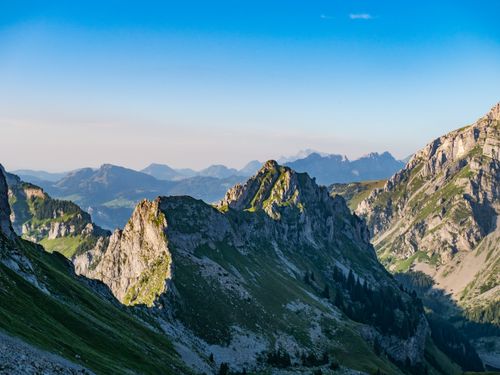 Free Breathtaking view of rocky mountains and lush valleys in Glarus, Switzerland. Stock Photo