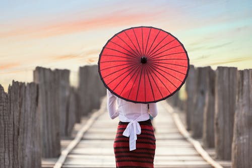 Free Woman Walking on Hot Air Balloon Stock Photo