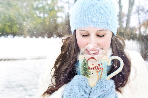 Free Young Woman in Snow Stock Photo
