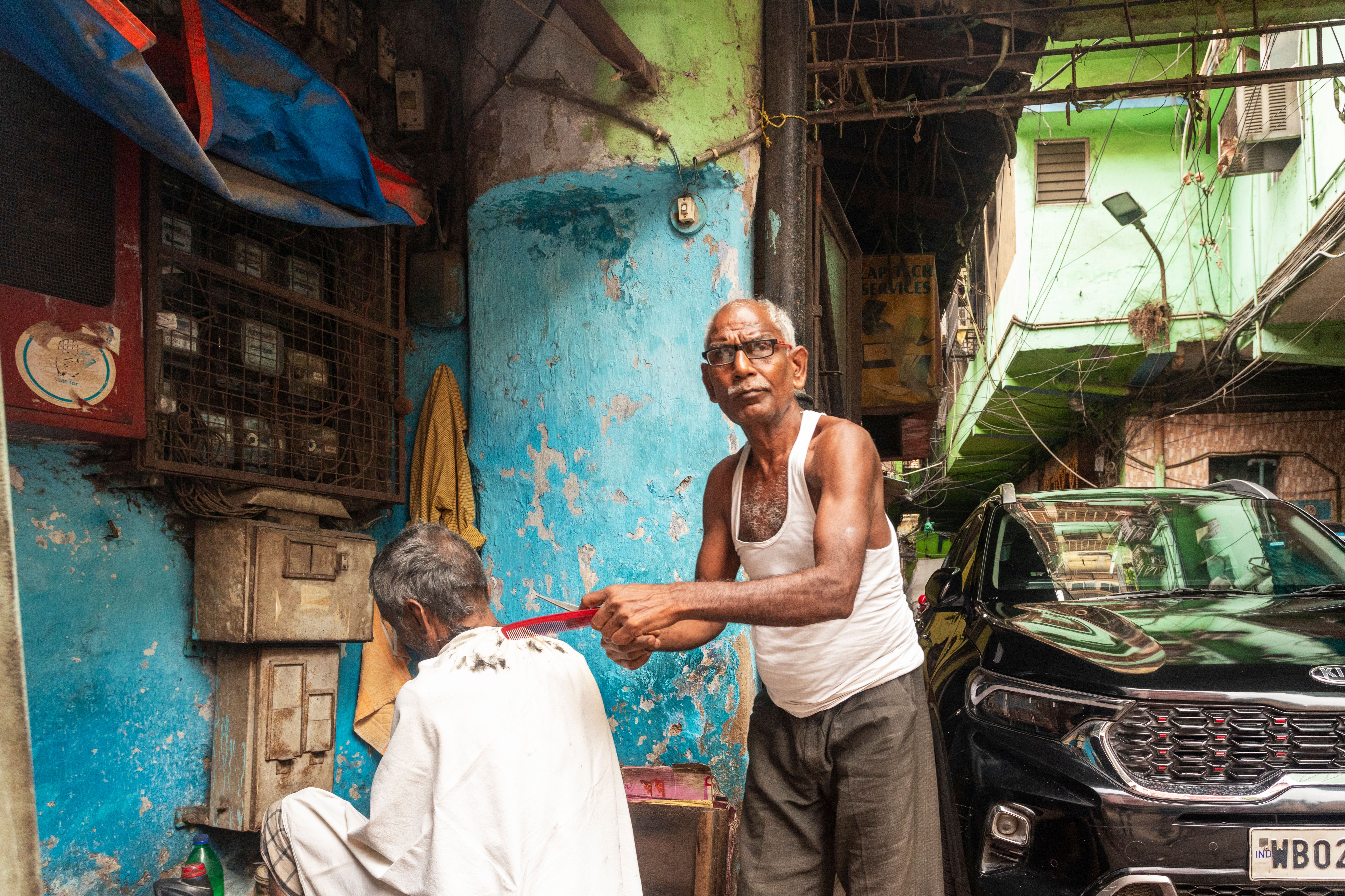Back View of a Man at a Barber Shop · Free Stock Photo