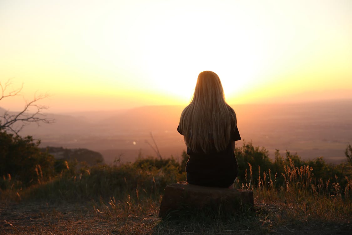 https://www.pexels.com/photo/woman-looking-at-sunset-247195/