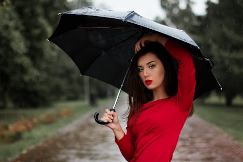 Free Portrait of Young Woman With Umbrella Stock Photo