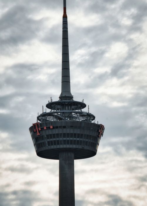 Free Dramatic view of the Colonius Tower in Cologne, Germany, with a cloudy sky background. Stock Photo