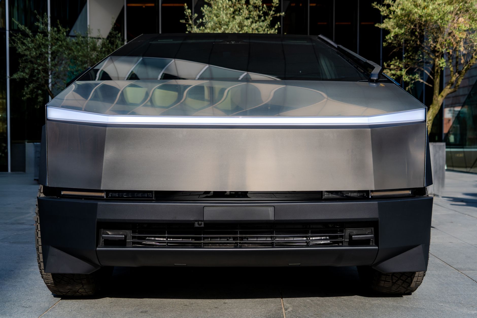 Close-up view of a futuristic, modern truck in an urban setting in Manchester, UK.
