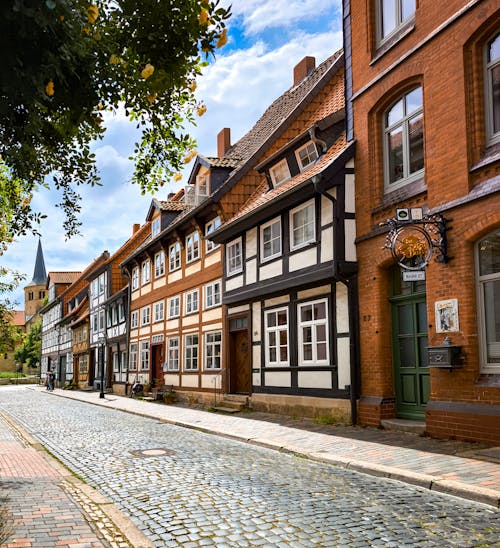 A cobblestone street with old buildings in germany