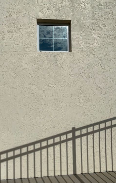 Window Shadow Cast Minimalist Shadow Cast on Textured Wall with Window · Free Stock Photo
