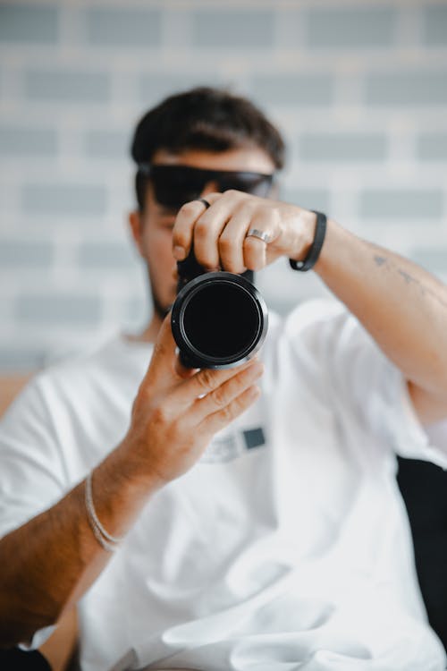 A man taking a picture with his camera