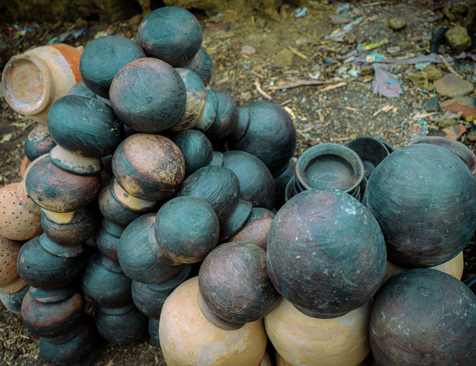 Close-up of a Pile of Vintage Pots · Free Stock Photo