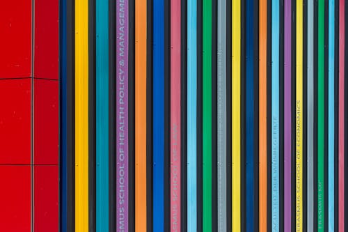 A colorful painting of a red, blue, green, yellow, and orange stripe