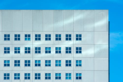 A building with windows and blue sky