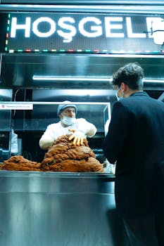 Vendor selling traditional Turkish çiğ köfte on the streets of Istanbul.