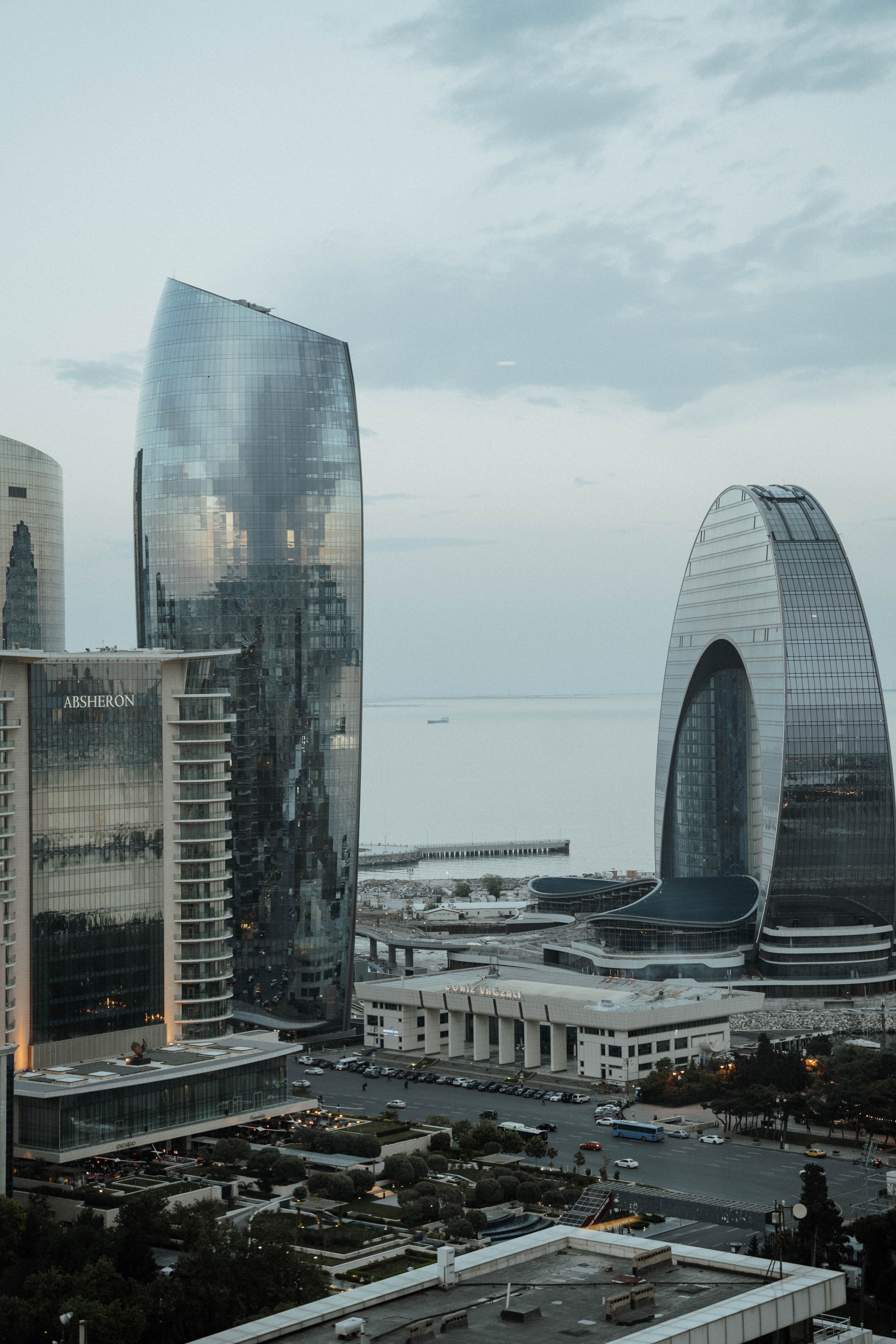 A stunning aerial view of modern buildings and the Caspian Sea coast in Baku, Azerbaijan.