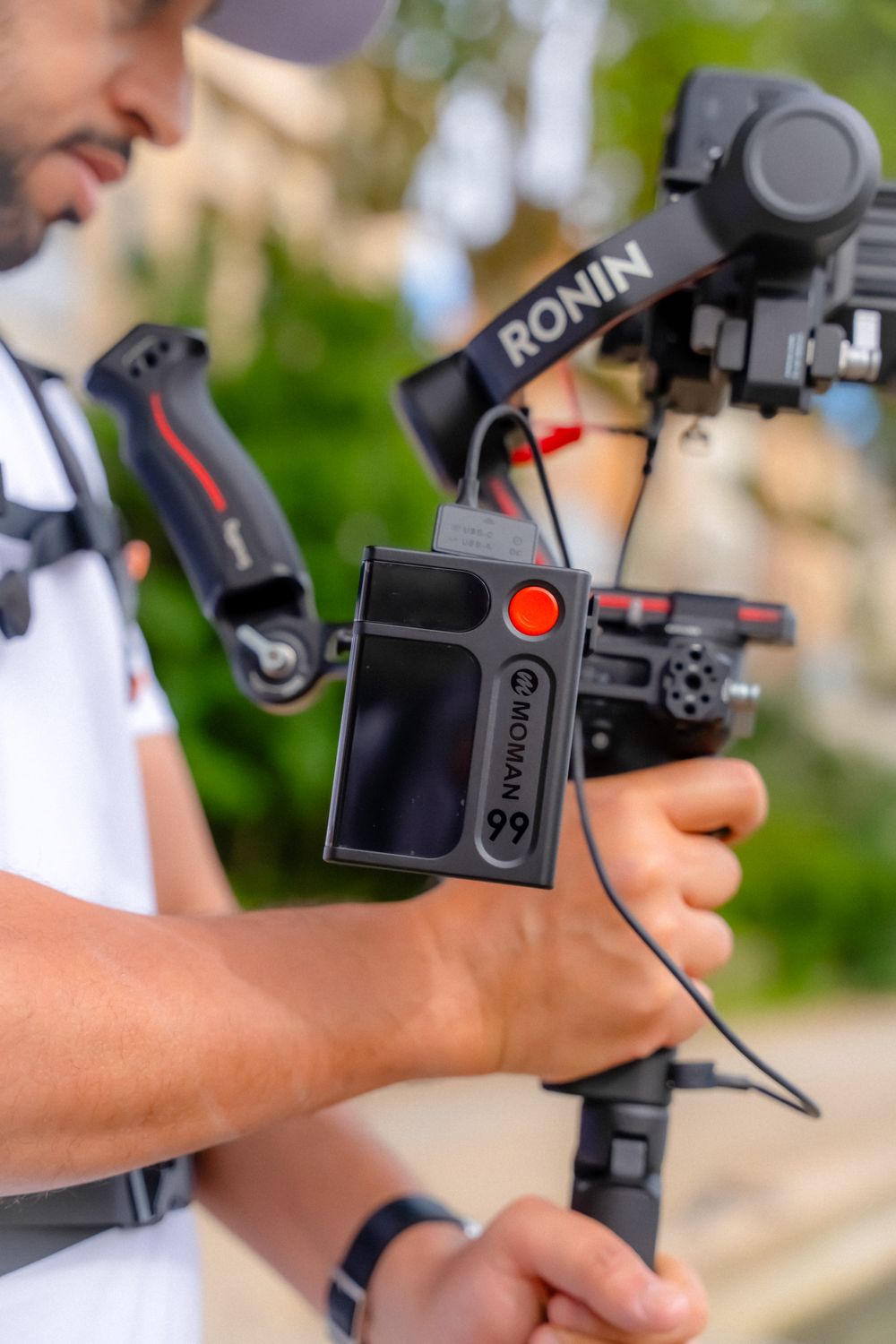 Ronan Camera Rig Man Recording with a Ronin Camera · Free Stock Photo
