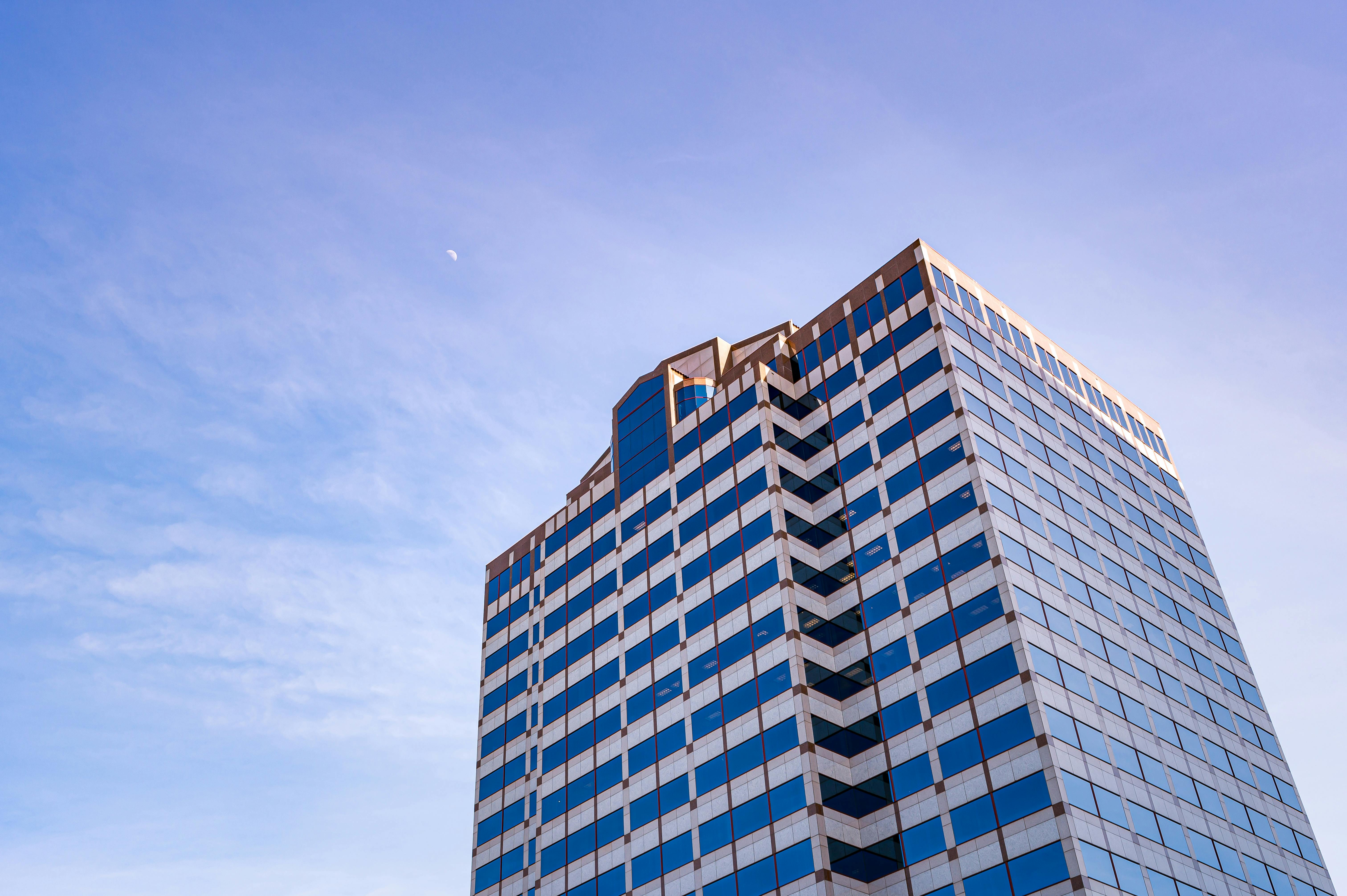 Photo of a blue high-rise building · Free Stock Photo