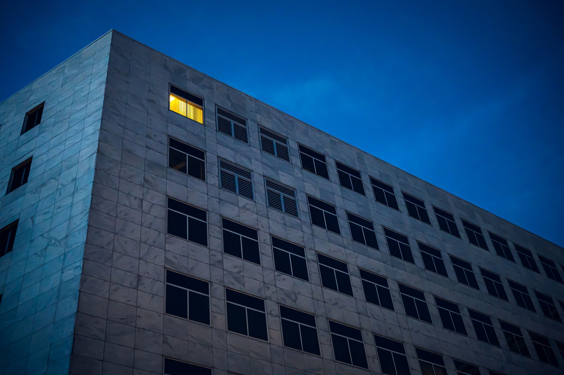 A symmetrical minimalist architectural structure representing the balance and permanence of institutional governance.