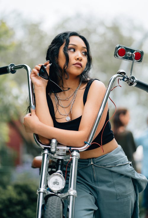Free Photo of Woman Leaning on Chopper Motorcycle Stock Photo
