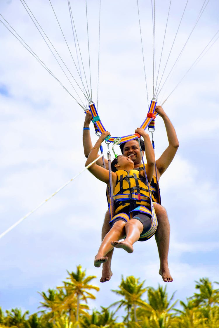 Photo Of Couple Parasailing