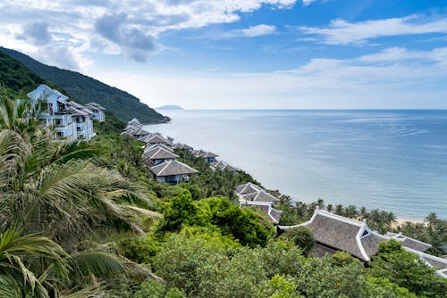 Aerial Photography of Villas Near Seashore