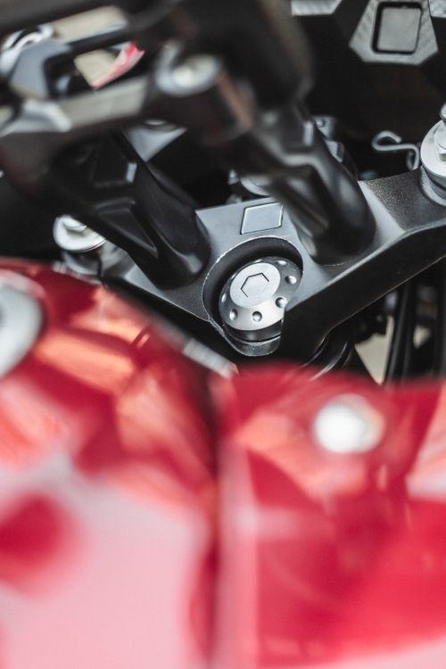Free Detailed close-up of motorcycle components showcasing intricate mechanical details and design. Stock Photo