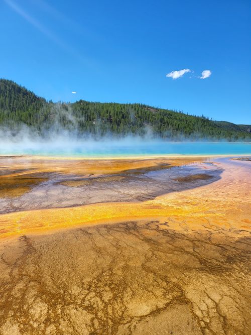 Free Explore the mesmerizing colors of Grand Prismatic Spring in Yellowstone, showcasing geothermal beauty in the USA. Stock Photo