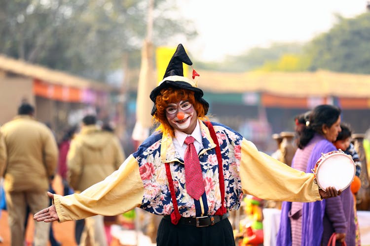 Photo Of Clown Holding Tambourine