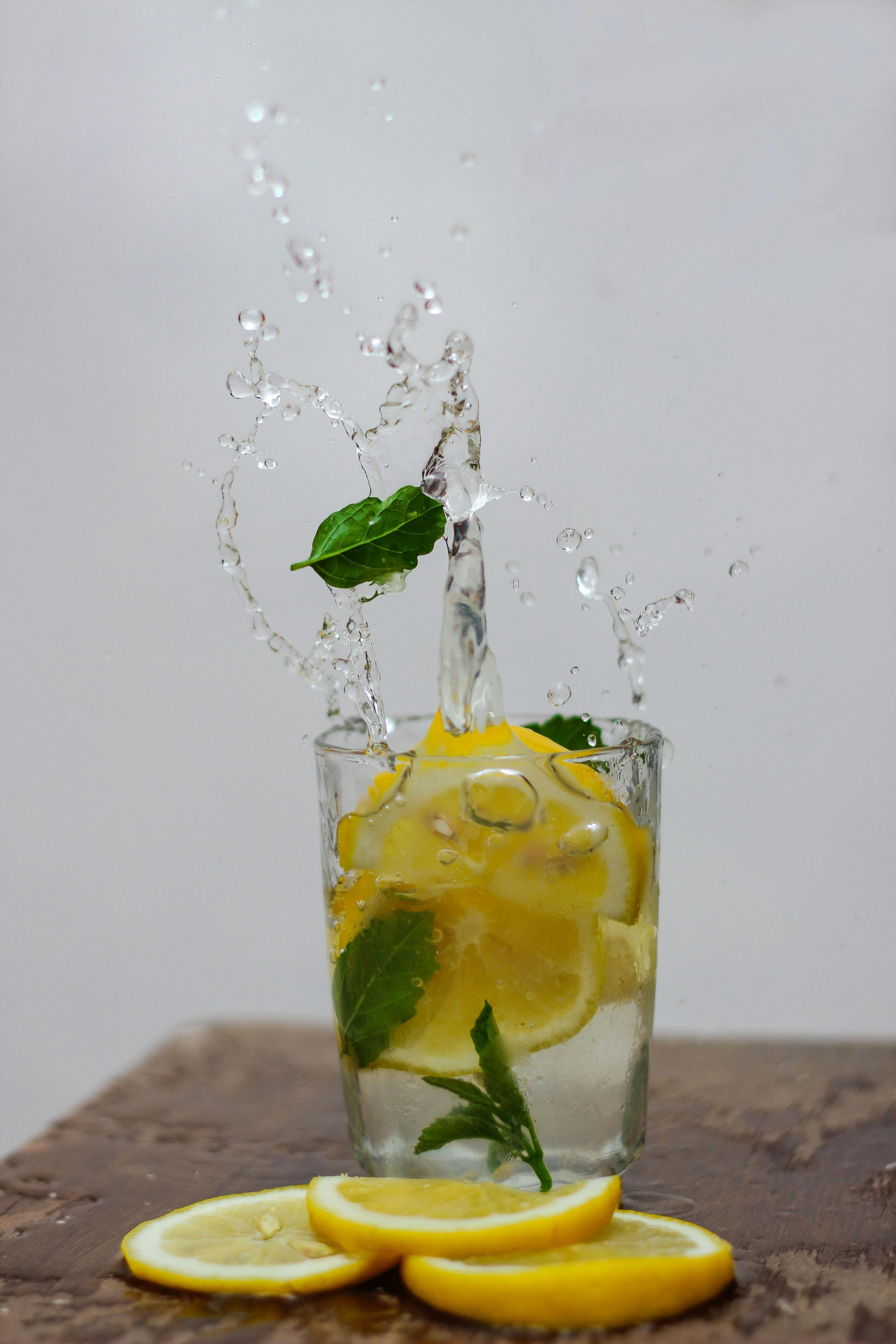 Free Photo of Lemon in Drinking Glass With Water Stock Photo