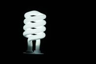 Illuminated Lamp Against Black Background